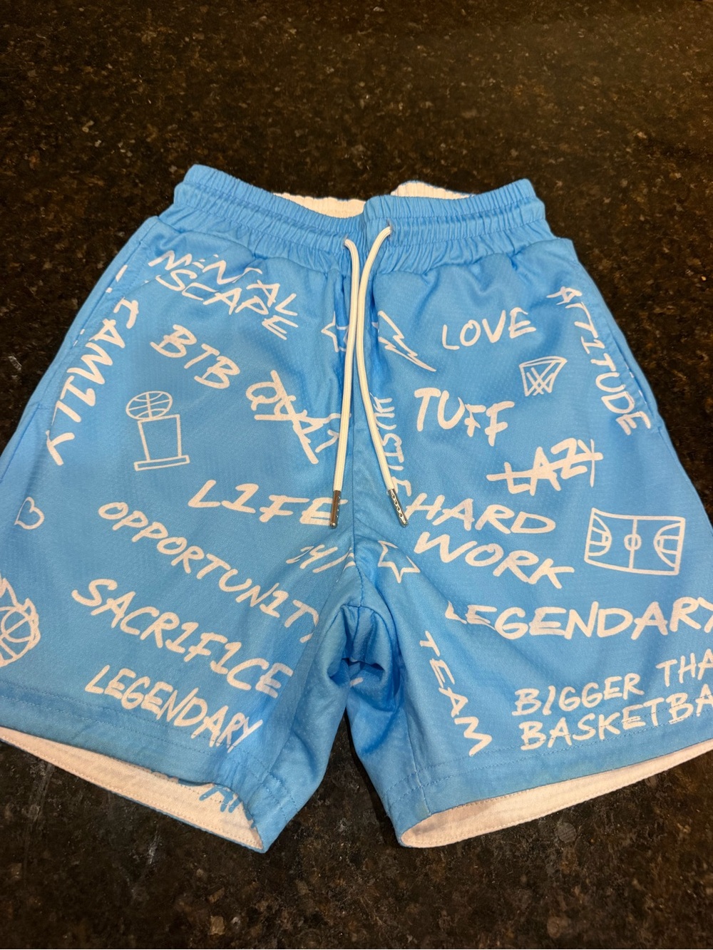 Reversible!! Like 2 pair in one  Light Blue Graphic shorts with drawstring